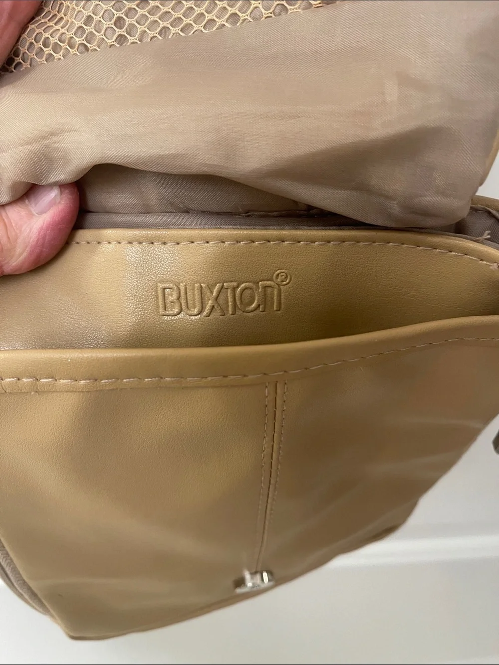 Buxton tan crossbody sling backpack